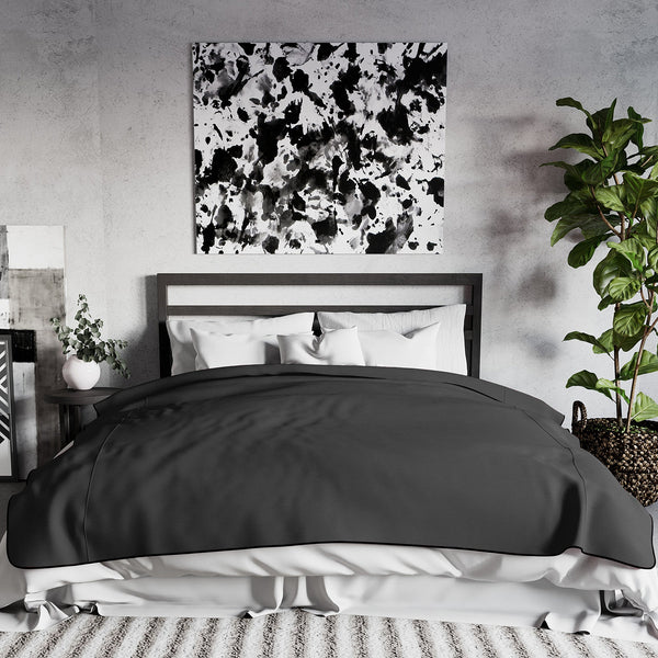 Fascinator Lush Throw Black Microvelvet - King Size on bed
