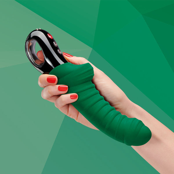 TIGER - JEWEL luxury vibrator in hand with emerald design