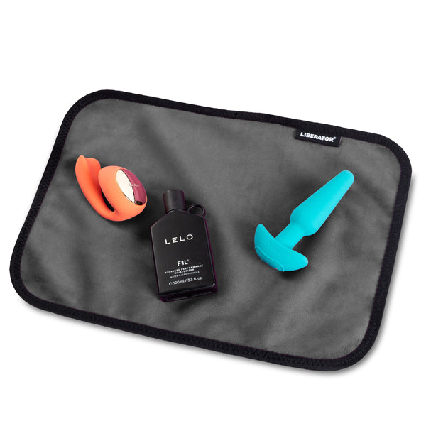 Fascinator Toy Pad - Moisture-proof Toy Pad, Microvelvet - Black with vibrators and lubricant.