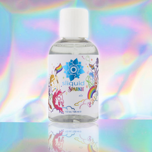 Sparkle Pride Lube 4.2oz bottle on an iridescent background, ideal for intimate wellness and sexual health.